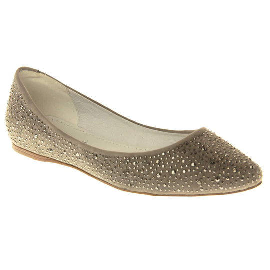 Gold flat pumps. Ballet style shoes with a taupe faux suede upper covered in gold diamantes. Cream leather lining and beige sole. Right foot at an angle.