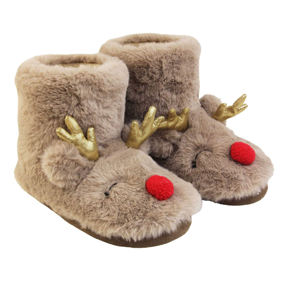 Kids animal slippers. Furry slipper boots in a brown faux fur with a cute reindeer face on. With a red pom pom nose and gold shiny antlers. The same colour fleece lines the boot. Both feet together at a slight angle.