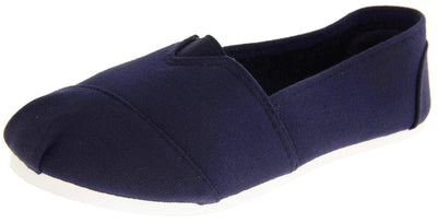 Kids canvas shoes. Navy blue canvas upper with elasticated panel in the middle where the tongue would be. White synthetic sole. Navy textile lining and insole. Left foot at an angle.
