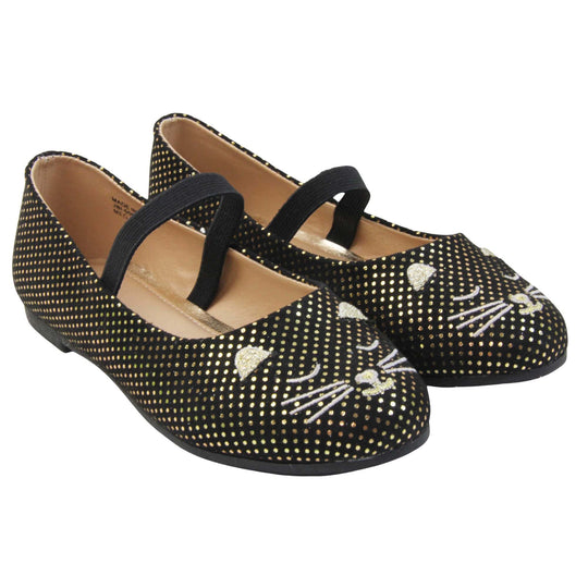 Kids cat shoes. Ballerina style shoes with black faux suede uppers with metallic gold dotty print and embroidered cat face to the front. With a black elasticated over the foot strap. Beige lining and dark brown sole with very slight heel.