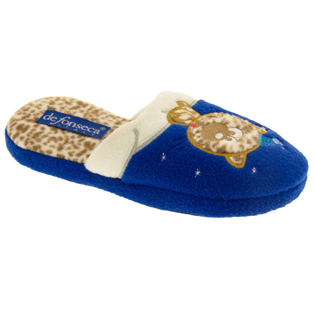 Kids cat slipper. Mule slipper with royal blue upper. Cream trim to the top of the upper, along the bridge of the foot. With an embroidered leopard print cat sat on the trim with a little blue night cap on and stars around him. The insole of the slipper is leopard print with a blue De Fonesca label on it. With a black sole. Right foot at an angle.
