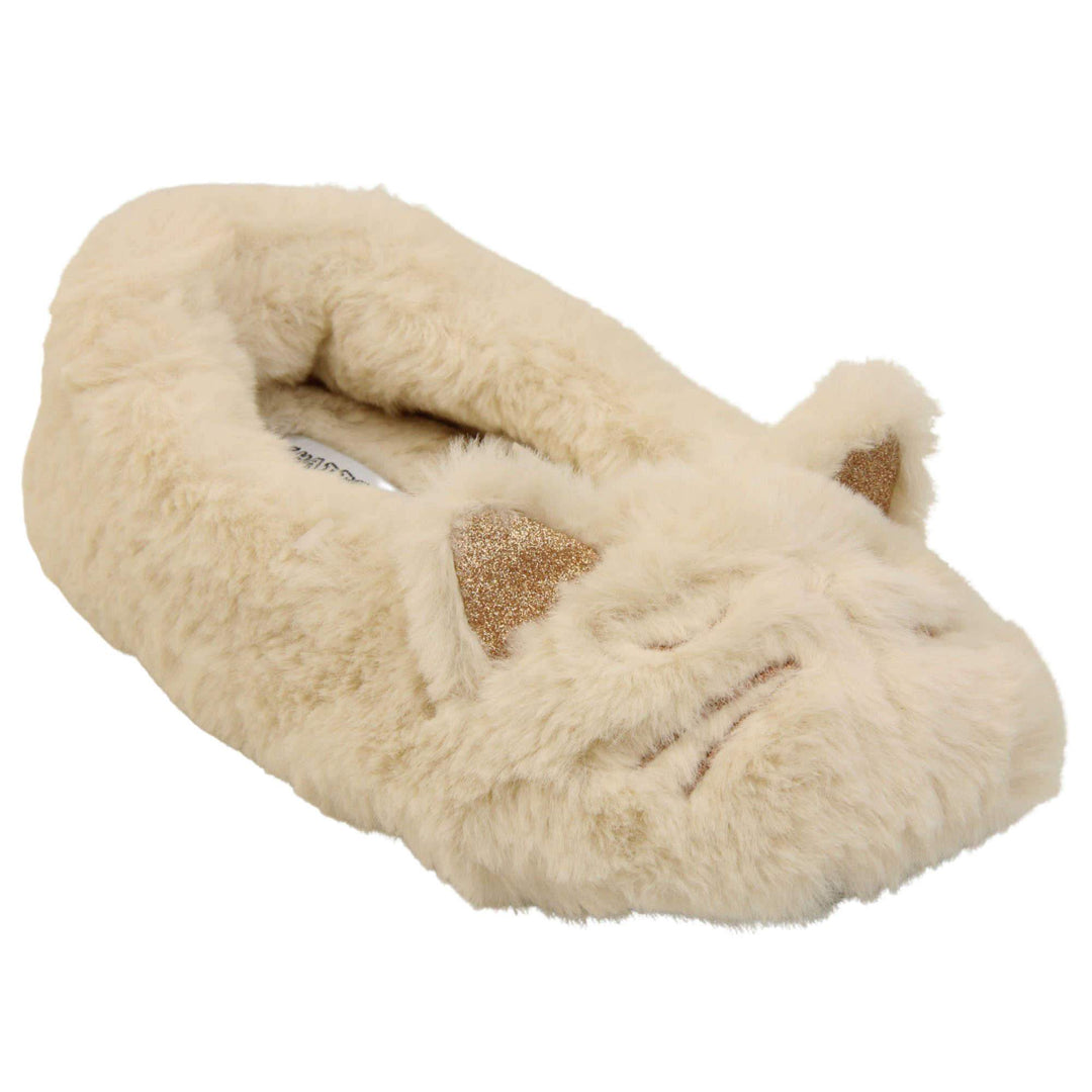 Kids cat slippers. Cream faux fur ballet style slipper with cat face stitched into the upper. Sparkly ear detail to the top of the upper. Lined with the same faux fur. Right foot at an angle.