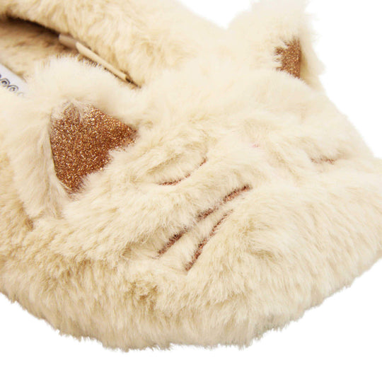 Kids cat slippers. Cream faux fur ballet style slipper with cat face stitched into the upper. Sparkly ear detail to the top of the upper. Lined with the same faux fur. Close up of cat face on upper.