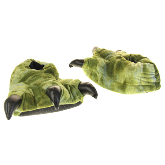 Kids dinosaur slippers. Cushioned slippers shaped like a dinosaur foot. Green textile outer with scale type pattern and black shiny padded claws. Inside is a textile lining. Black soft sole with bumps on for grip. Both feet facing top to tail, at an angle.