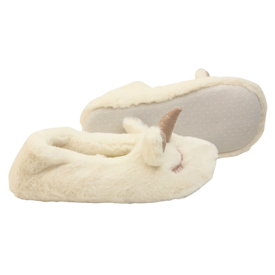 Kids fluffy slippers. Cream faux fur ballet style slipper with a unicorn face stitched into the upper. Sparkly ear and horn detail to the top of the upper. Lined with the same faux fur.  Both feet from a side profile with the left foot on its side to show the sole.