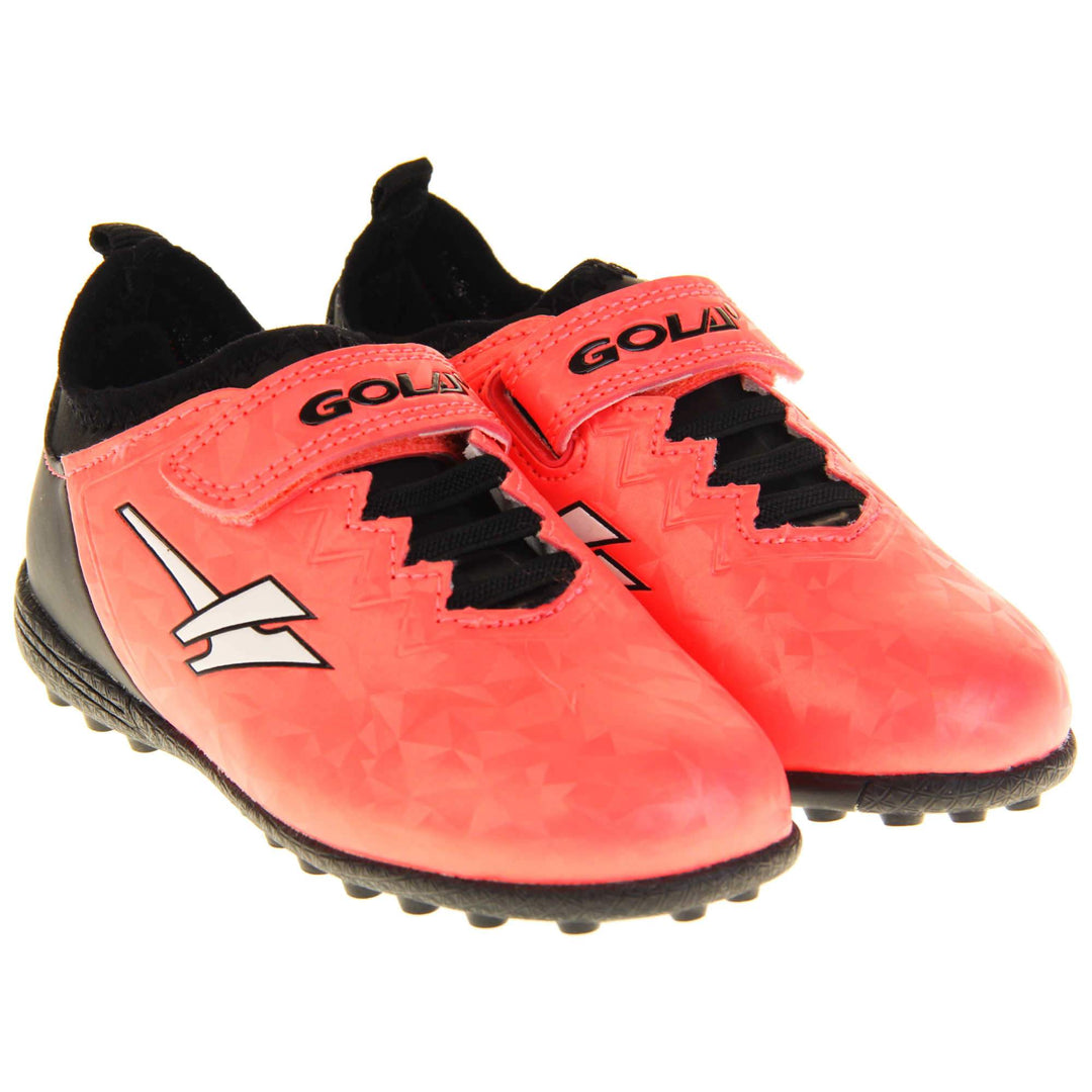 Kids football boots. Metallic red Gola boots with white Gola logo to the sides. With black heel, tongue and black elastic lace detail to the front. Red touch close strap with Gola branding across it. Black bumpy sole. Both feet together