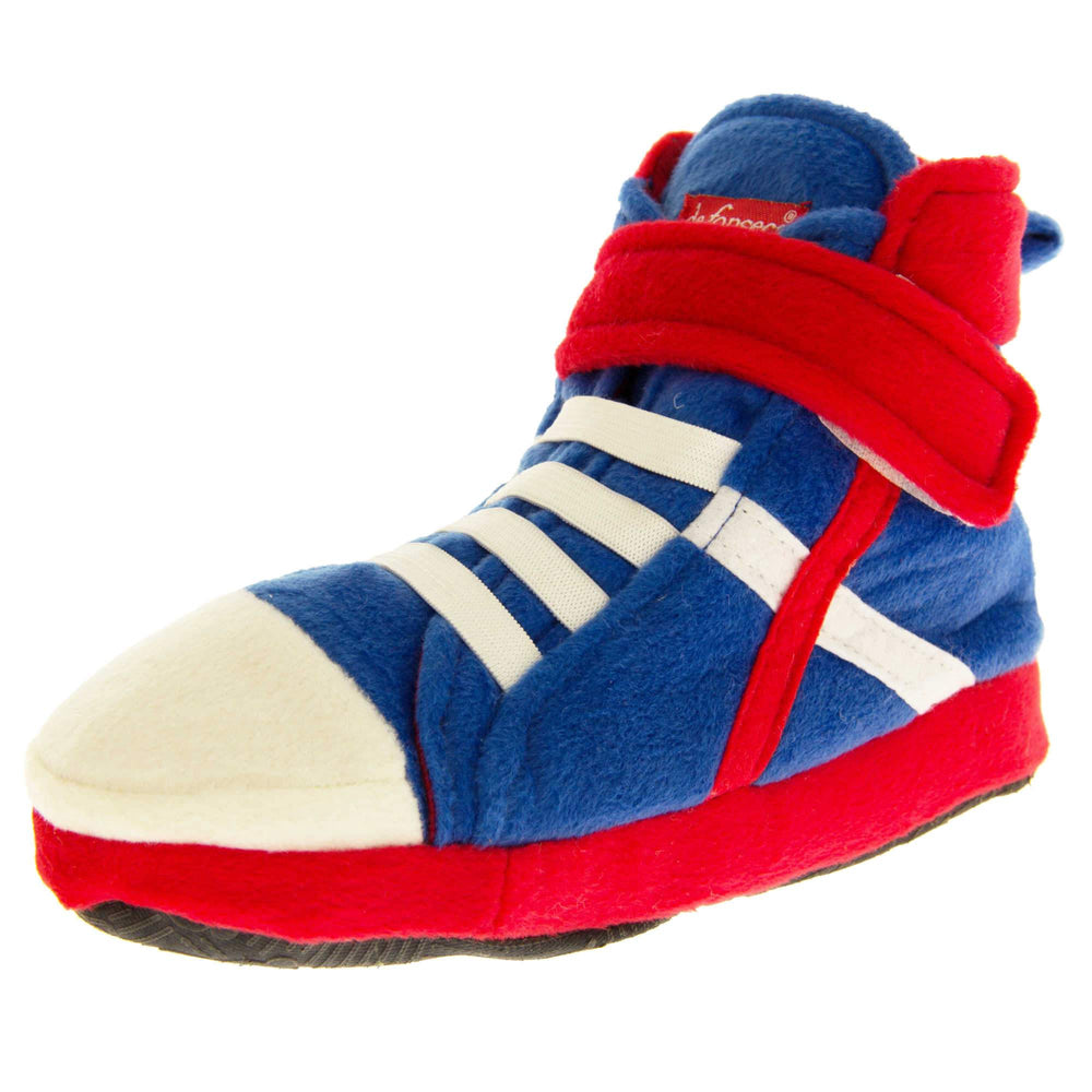 Kids High Tops Slippers. Slippers that look like high top trainers. Soft royal blue upper with white toes and elastic faux laces. White diagonal stripe on the side of the upper. Red touch fasten ankle strap and collar. Red line runs in a diagonal line to the sole. Forms a x with the white line. Thick red edging around the sole. Black sole to the bottom. Left foot at an angle.