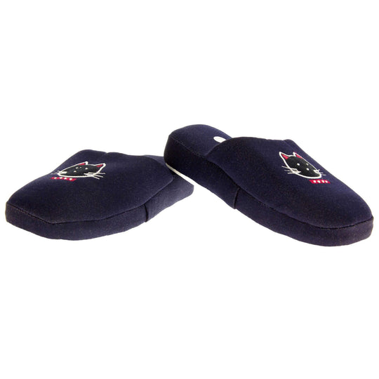 Kids mule slippers. Mule slippers made from a dark blue denim. Padded sole in the same denim with a firm white synthetic outsole. Stitched cat face in white and pink thread on the upper. Both feet in a V shape with the heel overlapping to form the point.