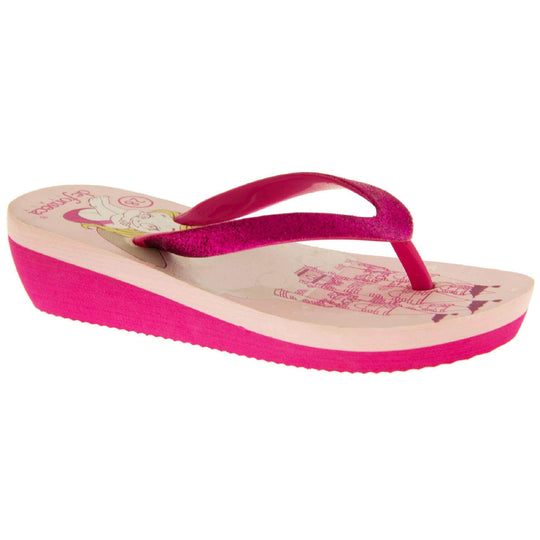 Foam wedge sandals for girls. Fuchsia bottom half of the sole with ridges for grip, baby pink top half with bright pink fantasy design to the insole. Fuchsia strap with toe post covered on top with bright pink glitter. Right foot at an angle.