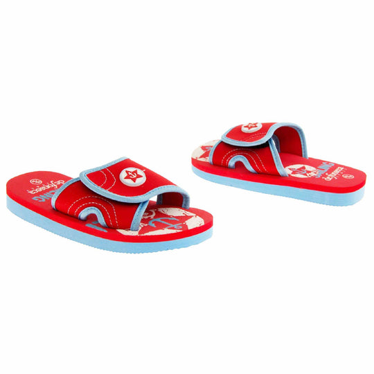 Kids slip on sandals. Slip on slider style sandals. Red touch fasten strap with light blue around the edge and a white synthetic circle in the centre of the strap with red anchor in the middle. The foam sole is two toned. The top half is red, the bottom half is pale blue. Both shoes at a slight angle facing top to tail.