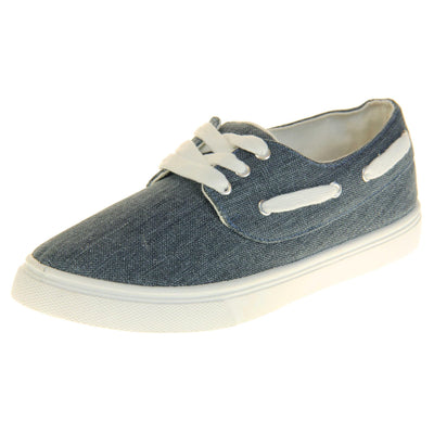 Ladies canvas slip on shoes. Sneaker style shoes with a  navy blue canvas upper and white laces and white lace detailing around the outside of the collar. White outsole with slip-resistant grip to the bottom. Left foot at an angle.