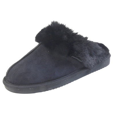 Ladies Memory Foam Slippers. Mule style slippers with black faux suede uppers. Black faux fur lining and collar. Firm black outsole with grip on the bottom. Left foot at an angle.