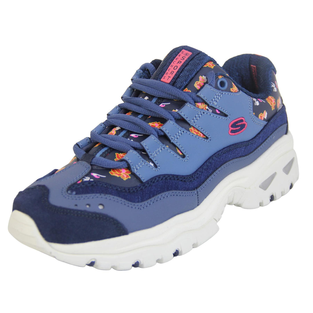 Blue Sketchers trainers with denim edging and a floral print. Lace up fastening with thick white soles. left foot view