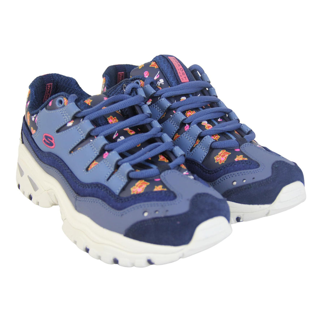 Blue Sketchers trainers with denim edging and a floral print. Lace up fastening with thick white soles.  both next to each other view