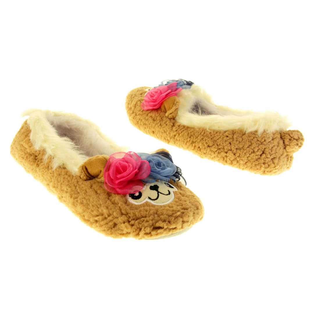 Llama slippers womens. Ladies slippers in a ballerina style. With brown faux fur upper, cute embroidered llama face and rose detail headband. Cream faux fur collar and lining. Beige textile sole with bumps to the bottom for grip. Both feet at an angle, facing top to tail.