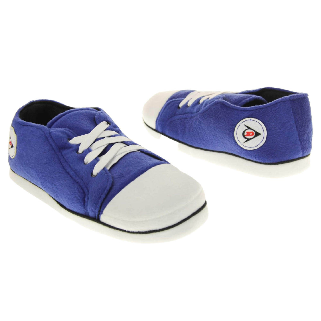 Low rise sneaker slippers. Blue soft fabric upper in low-rise sneaker style. With white elasticated laces and white circle with Dunlop logo to the side. White edge around the sole of the shoe. Black textile lining. Black sole with bumps for grips. Both feet facing top to tail at an angle.