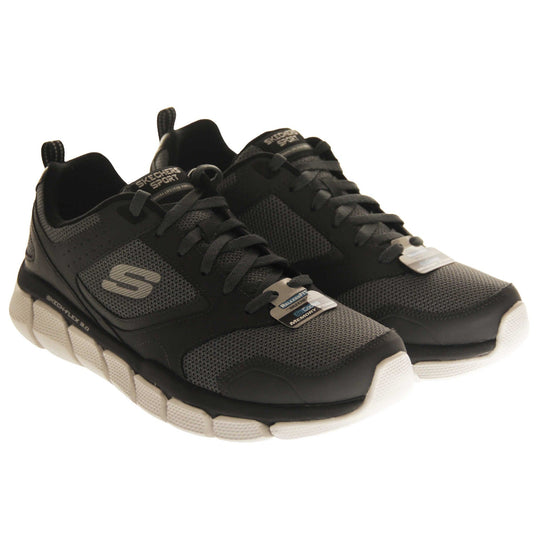Mens black Skechers. Dark grey mesh and black leather upper with black laces and black lining. Grey Skechers logo to the side and chunky white outsole with grip. Both shoes together at an angle.