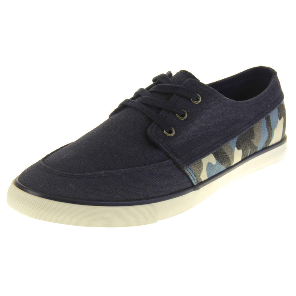 Mens camouflage pumps. Navy blue canvas upper with blue camo strip around the heel. Navy laces. White synthetic sole and dark textile lining. Left foot at an angle