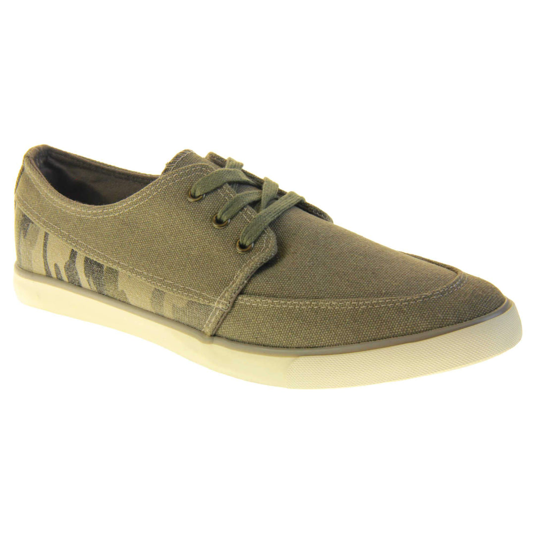 Mens camouflage trainers. Grey canvas upper with grey camo strip around the heel. Grey laces. White synthetic sole and dark textile lining. Right foot at an angle