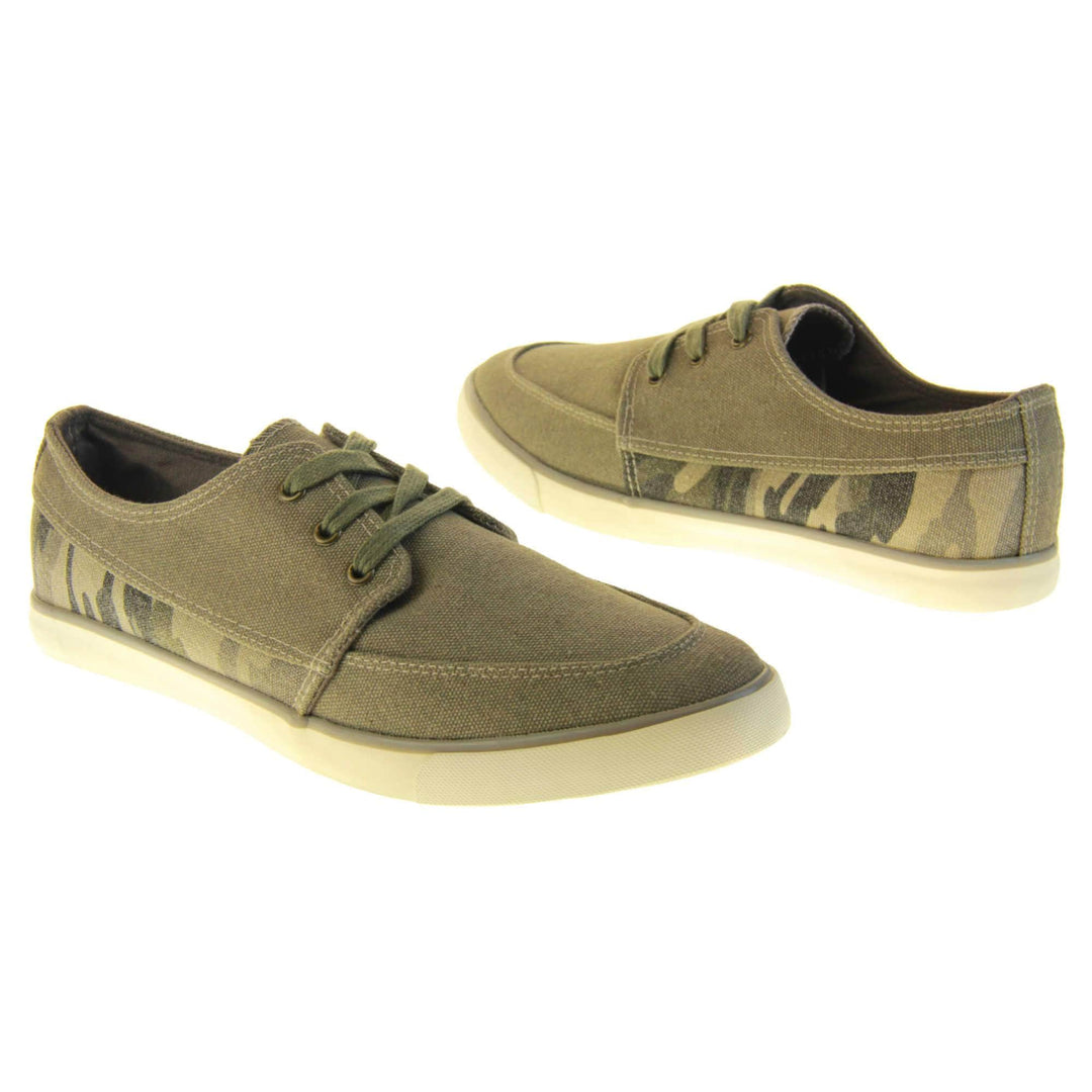Mens camouflage trainers. Grey canvas upper with grey camo strip around the heel. Grey laces. White synthetic sole and dark textile lining. Both feet at a slight angle facing top to tail.