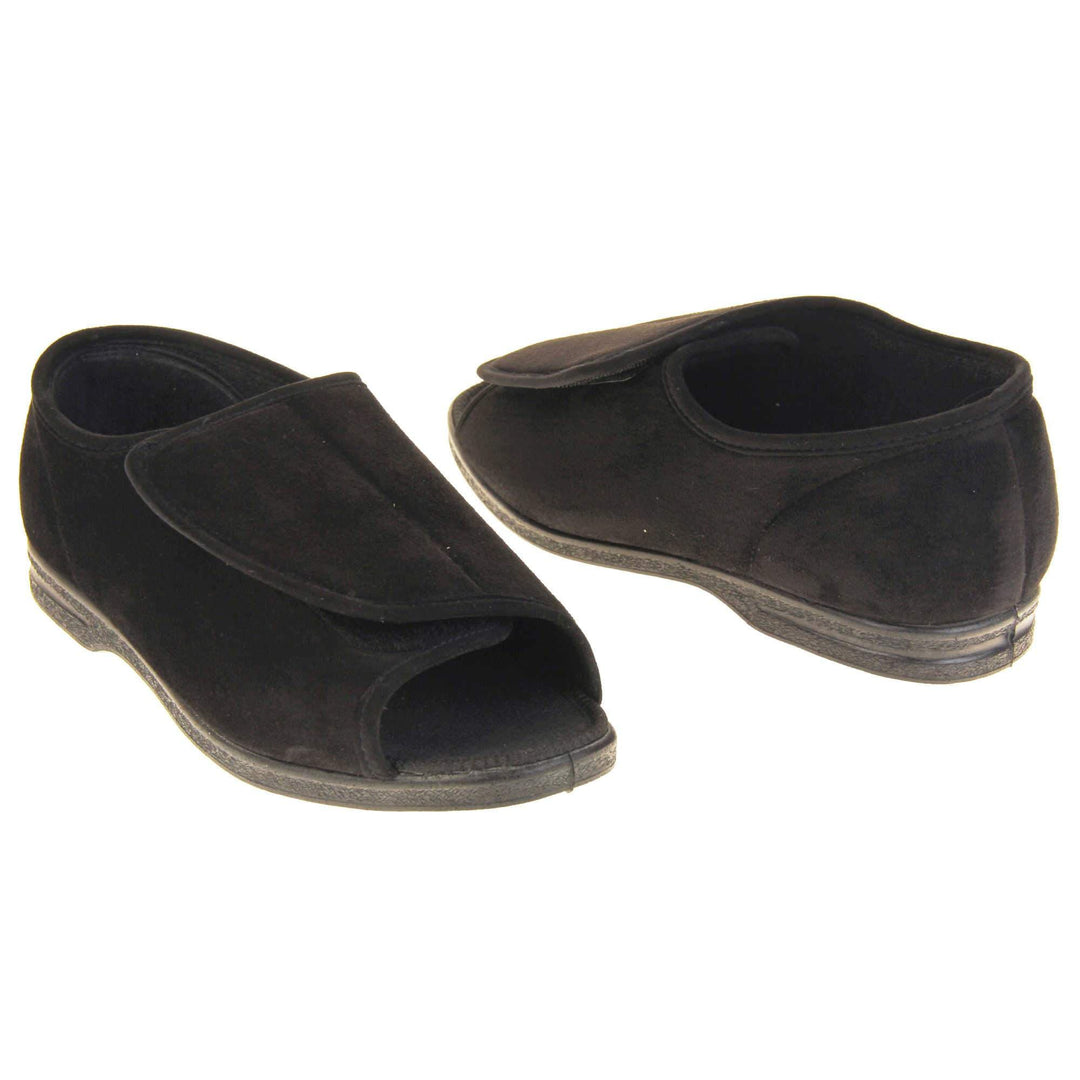 Mens Extra Wide Open Toe Slippers. Full back slippers with black textile upper. Open toe and the top of the shoe is an adjustable touch fasten strap. Black textile lining. Firm black sole. Both feet facing top to tail, at an angle.