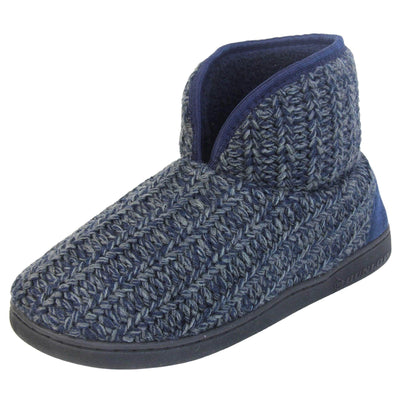Mens memory foam slippers. Slipper boots with a navy blue knit upper. Navy fabric piping around the collar. Navy textile patch over the heel to reinforce. Thick black synthetic sole with Dunlop branding on. Navy faux fur lining. Left foot at an angle.
