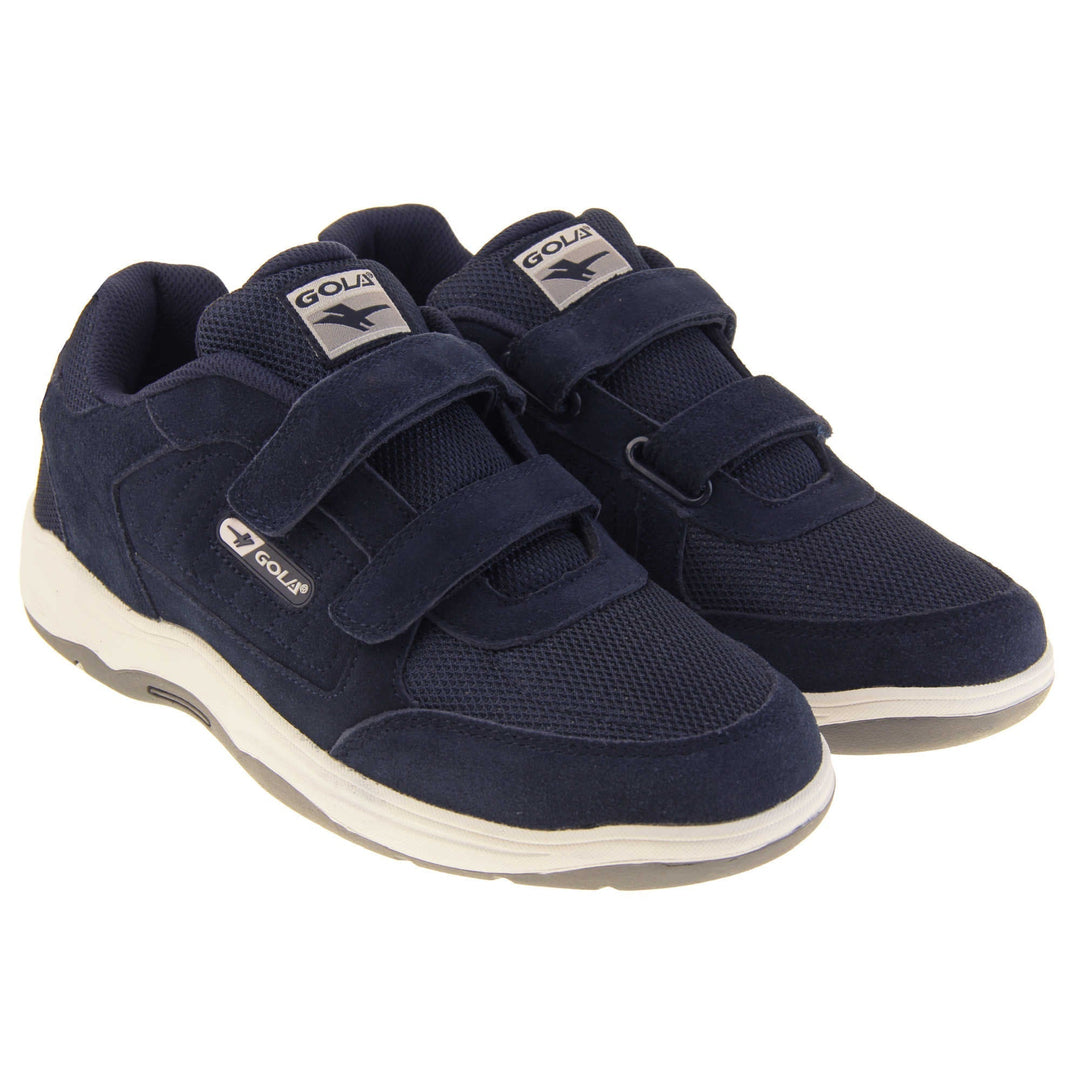 Mens navy trainers. Classic trainer style in wide fit. With navy blue coated leather upper and navy stitching detail. Two navy touch fasten straps with navy tongue and blue textile lining. Black and white Gola branding to the side. Black outsole. Both feet together from an angle.