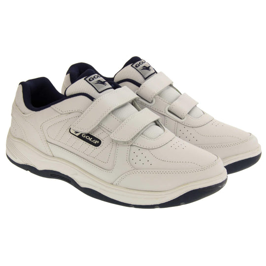 Mens touch fasten trainers. Classic trainer style with white leather upper and white stitching detail. Two white touch fasten straps with white tongue and black textile lining. Black and white Gola branding to the side. White outsole with black bottom. Both feet together from an angle.