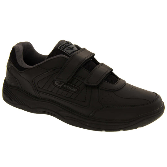 Mens trainers for wide feet. Classic trainer style with black leather upper and black stitching detail. Two black touch fasten straps with black tongue and black textile lining. Black and grey Gola branding to the side. Black outsole. Right foot at an angle.