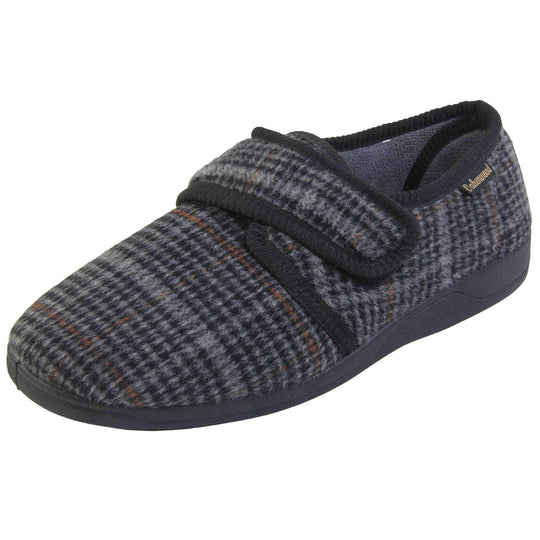 Mens adjustable slippers. Full back slippers with a black and grey check upper and black edging around the strap and collar of the shoe. Touch fasten strap across the bridge of the foot. Chunky black synthetic sole. Left foot at an angle.