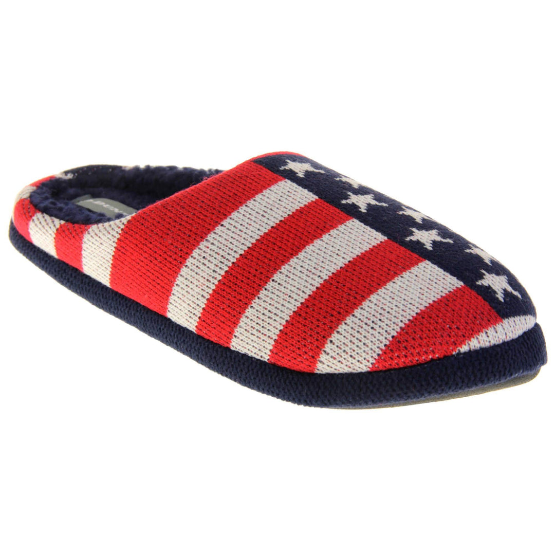 Mens American Flag slippers. Mens slippers in a mule style. With red, white and blue USA flag knit fabric upper. Blue faux fur lining. Black hard synthetic soles with grip to the base. Right foot at an angle.