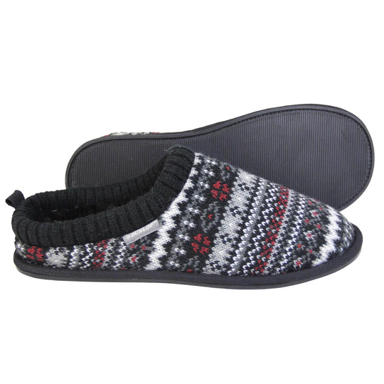 Mens black mule slippers. Mens slippers in a mule style. With black knit fabric upper with grey, red and white pattern. Black faux fur lining. Black hard synthetic soles with grip to the base. Both feet from a side profile with the left foot on its side to show the sole.