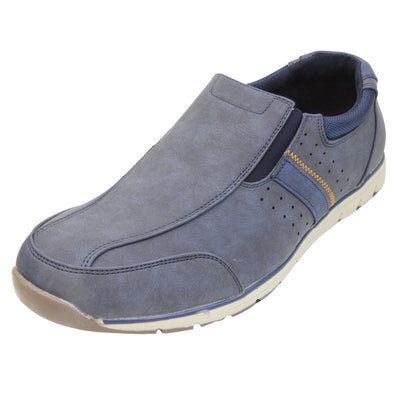 Mens blue suede trainers. Slip on trainers with navy blue faux suede uppers. Elasticated side gussets in dark blue and a navy diagonal stripe to the side of the shoe. Dark blue collar around the neck of the shoe with Oakenwood branding to the heel. Dark blue lining and a white outsole with grey sole. Left foot at an angle.