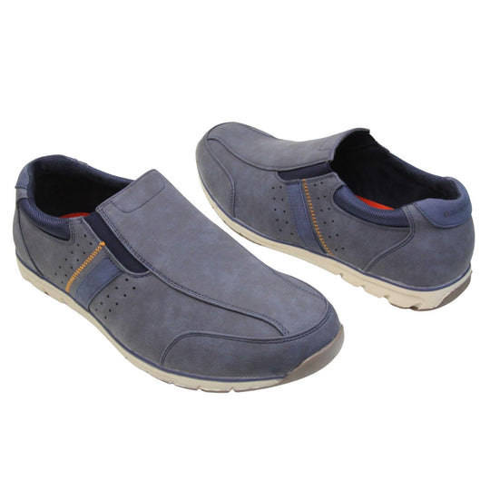 Mens blue suede trainers. Slip on trainers with navy blue faux suede uppers. Elasticated side gussets in dark blue and a navy diagonal stripe to the side of the shoe. Dark blue collar around the neck of the shoe with Oakenwood branding to the heel. Dark blue lining and a white outsole with grey sole. Both feet at an angle facing top to tail.