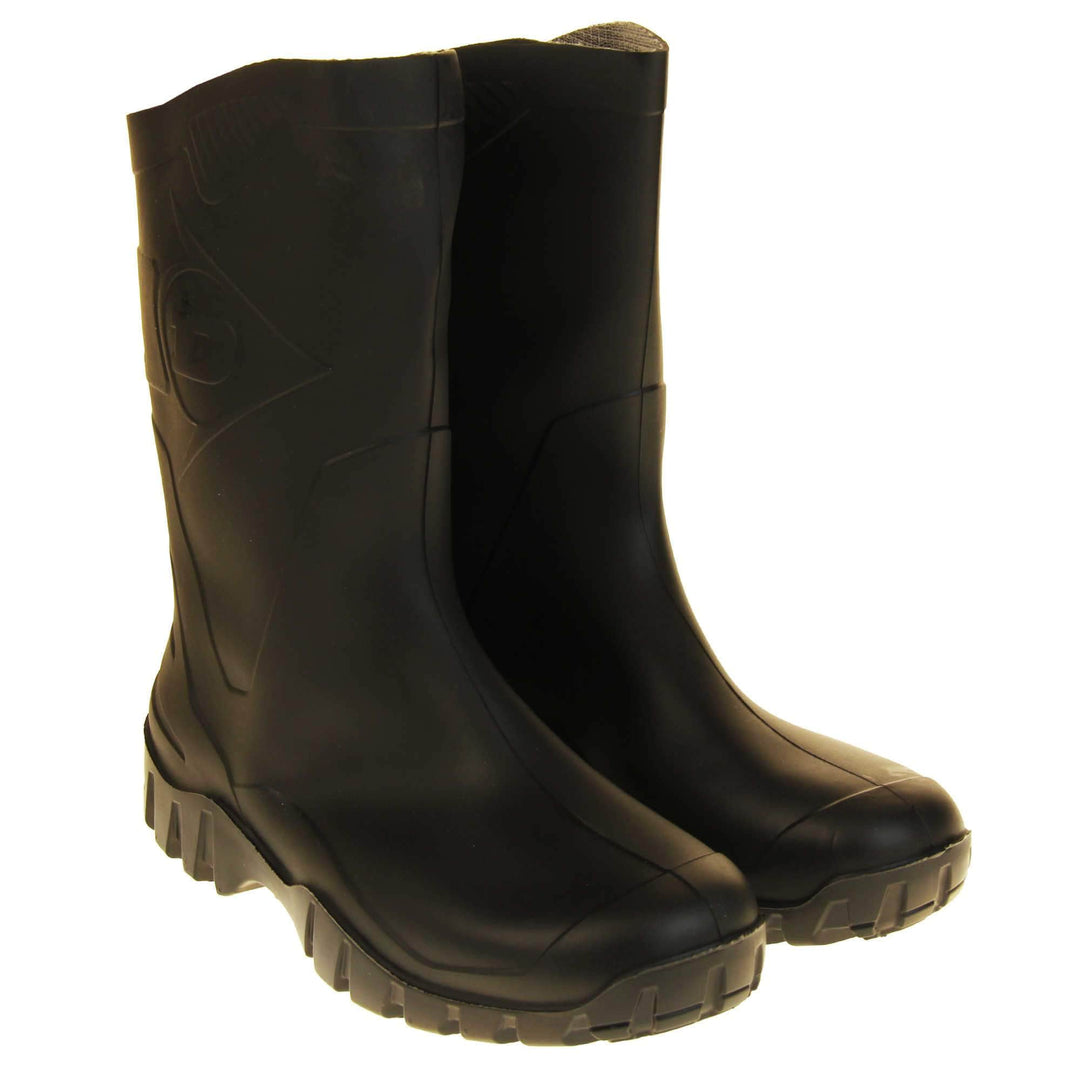 Mens Short Wellies. Black calf length wellies with a waterproof rubber upper and sole. With embossed pattern down the back of the boot and Dunlop logo on the side. Both feet together at an angle.