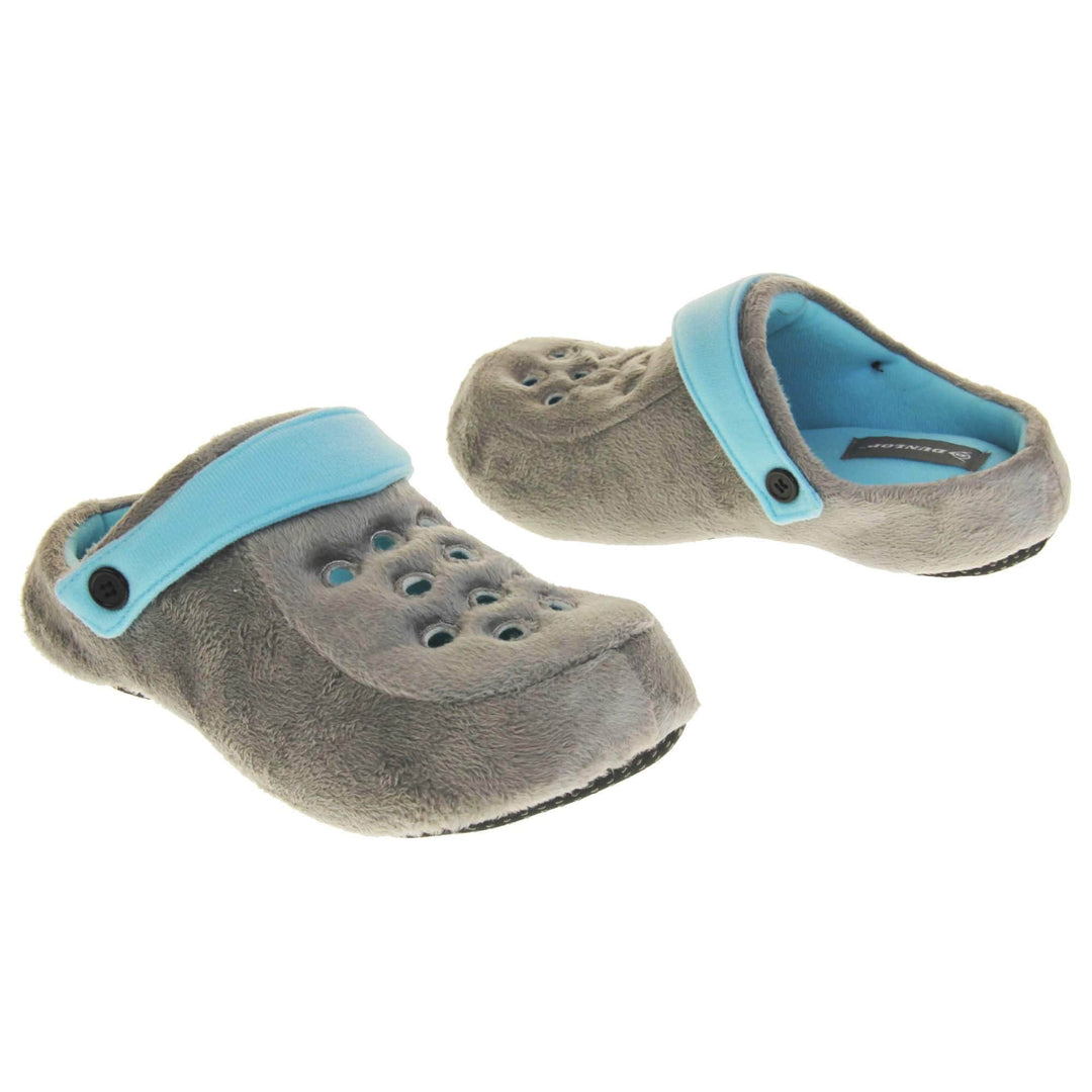 Mens clog slippers. Grey fabric clog style novelty slipper. Cut out holes on the upper. Light blue strap that goes along the back of your heel. The strap can be moved along the top of the shoe instead to make the shoe a mule. Both shoes at an angle about 1 inch apart and facing top to tail.