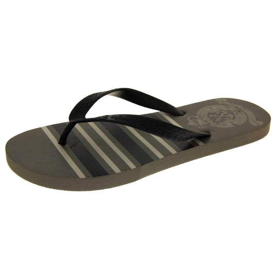 Mens flip flop sandals. Flip flop with dark grey striped sole and black strap in a toe-post design. Left foot at a slight angle.