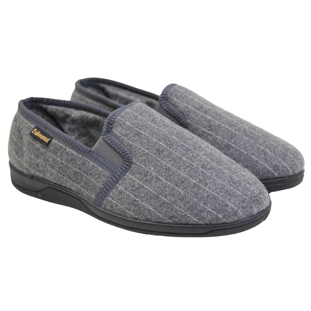 Mens full back slippers. Grey wool effect upper with white pin stripes. Grey elasticated panels joining the tongue to the top of the slippers. Small black label on the outside rim, with Oakenwood branding sewn in gold. Grey faux fur lining. Both feet together at an angle.