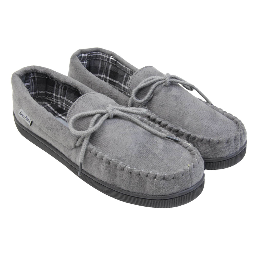 Mens grey moccasin slippers. Moccasin style slipper with grey faux suede upper and rope style bow to the top. Grey Rosebank label to the outside. Dark and light grey and white plaid textile lining. Black rubber sole. Both feet together at an angle.