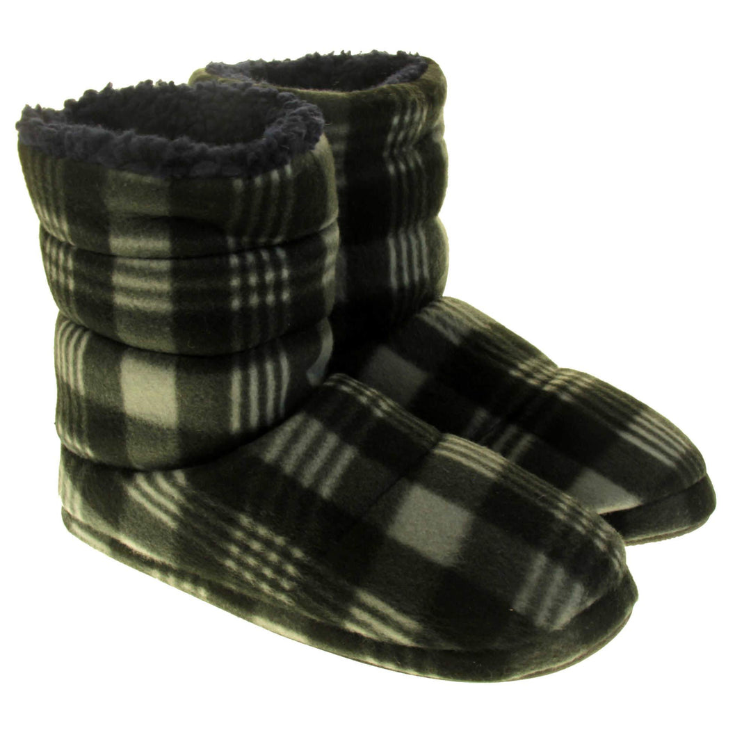 Mens grey slippers boots. Slipper boots with a soft grey fabric upper with black check. With a firm black synthetic sole with grip to the base. Black faux fur lining. Both feet together at a slight angle.