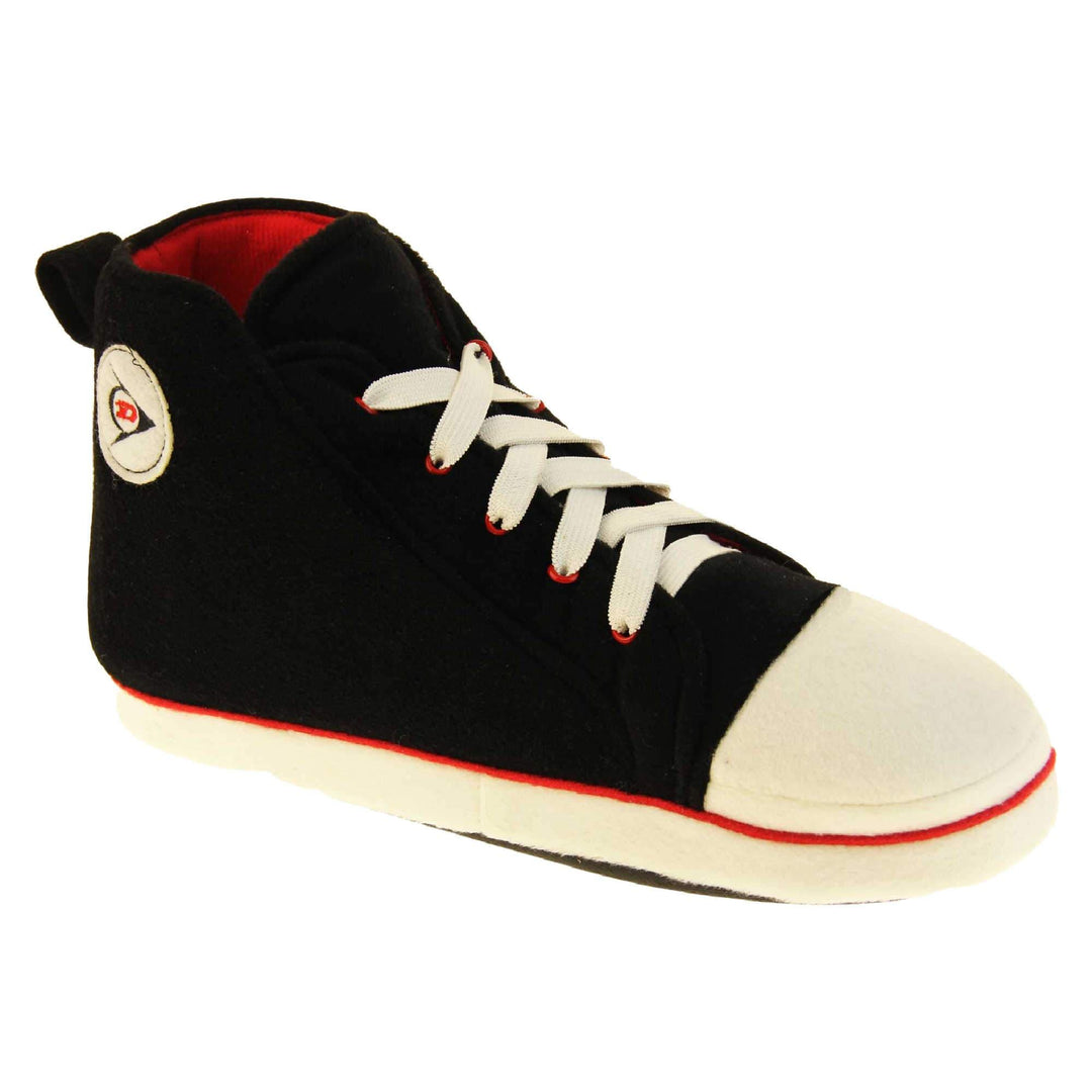 Mens high top slippers. Black soft fabric upper in high-top sneaker style. With white elasticated laces and white circle with Dunlop logo to the side. White edge around the sole of the shoe. Red textile lining. Black sole with bumps for grips. Right foot at an angle.