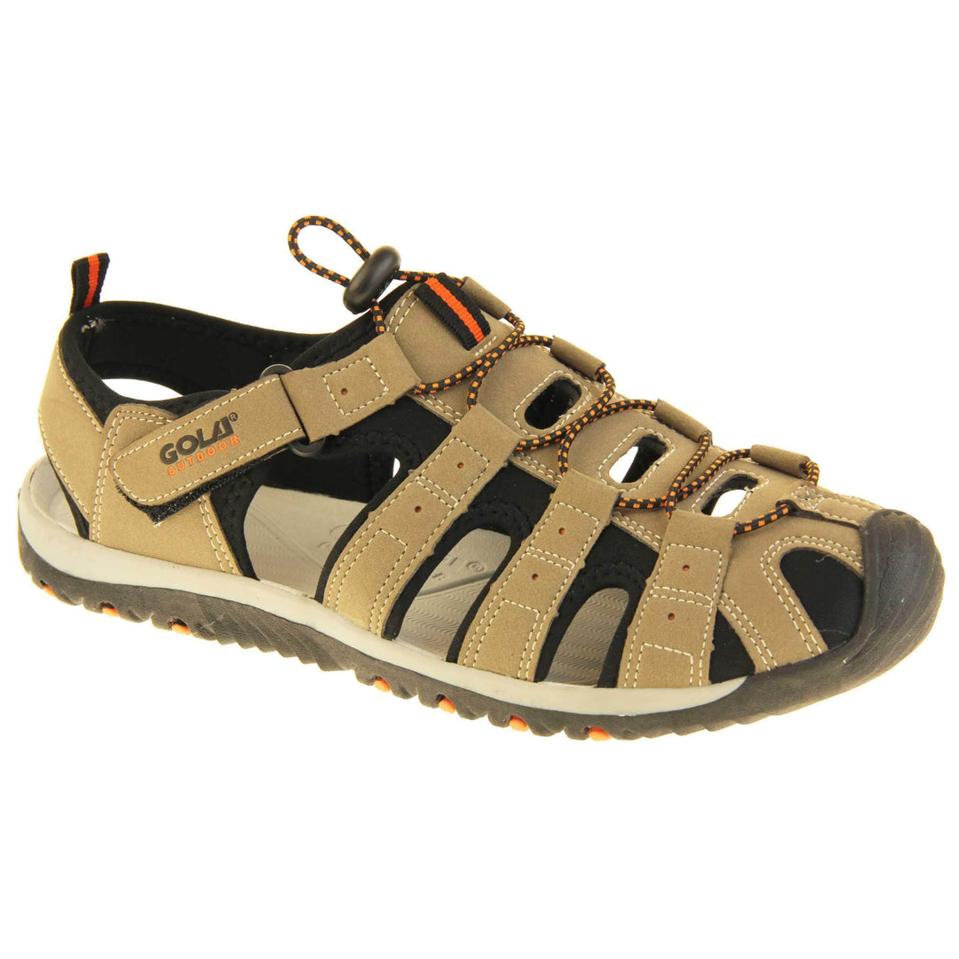 Mens hiking sandals. Traditional style sandal with brown and black fabric strappy upper. Black rubber toe caps and black synthetic sole with orange grips to the bottom. Elasticated laces to the front of the shoe and touch fasten strap by the ankle. Right foot at an angle.