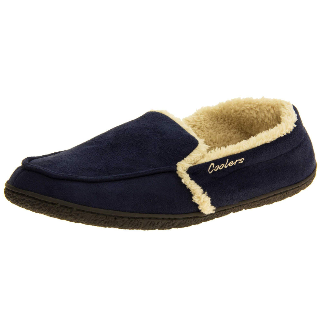 Mens lined slippers. Full back slippers with navy blue faux suede upper with cream synthetic fur detail. Cream Coolers branding on the outside. Cream faux fur lining. Black sole with grip. Left foot at an angle.