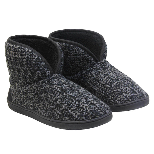 Mens memory foam slipper boots. Slipper boots with a black knit upper. Black fabric piping around the collar. Black textile patch over the heel to reinforce. Thick black synthetic sole with Dunlop branding on. Black faux fur lining. Both feet together at a slight angle.