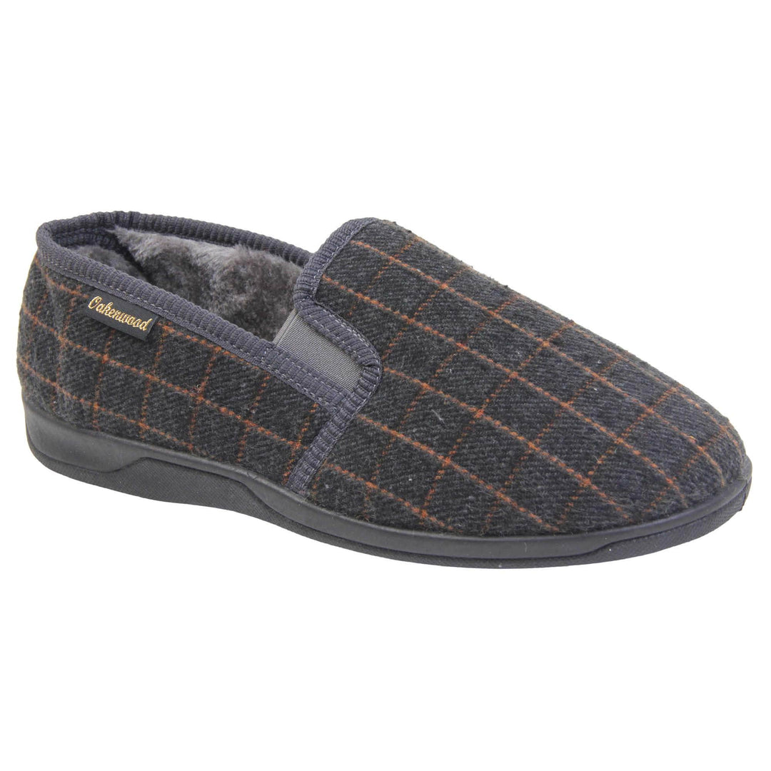 Mens memory foam slippers. Full back slippers with grey wool effect upper with orange check. Grey elasticated panels joining the tongue to the top of the slippers. Small black label on the outside rim, with Oakenwood branding sewn in gold. Grey faux fur lining. Right foot at an angle.