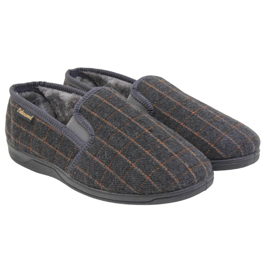 Mens memory foam slippers. Full back slippers with grey wool effect upper with orange check. Grey elasticated panels joining the tongue to the top of the slippers. Small black label on the outside rim, with Oakenwood branding sewn in gold. Grey faux fur lining. Both feet together at an angle.