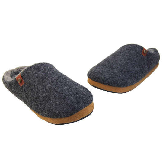 Mens memory foam slippers. Mule style slippers with a black felt upper with brown rim around the base and a brown faux leather strap with stud detail along the collar of the slipper. Grey Wool effect faux fur lining with a grey Dunlop label on the middle of the insole. Firm black sole with wavy lines for grip. Both shoes in a V shape.