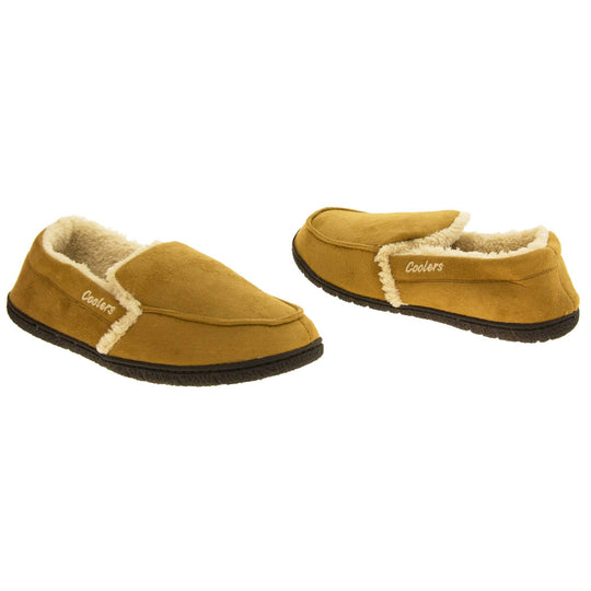 Mens plush slippers. Full back slippers with tan faux suede upper with cream synthetic fur detail. Cream Coolers branding on the outside. Cream faux fur lining. Black sole with grip. Both feet facing top to tail, at an angle.