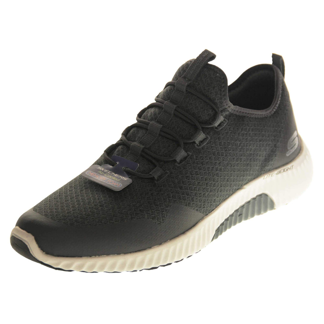 Mens slip on Skechers. Charcoal grey mesh upper with black elasticated laces for a slip on trainer. Black Skechers logo to the heel and chunky white outsole with black bottom with grip. Left foot at an angle.