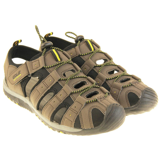 Mens sport sandals. Traditional style sandal with brown and black fabric strappy upper. Black rubber toe caps and black synthetic sole with yellow grips to the bottom. Elasticated laces to the front of the shoe and touch fasten strap by the ankle. Both feet together from a slight angle.